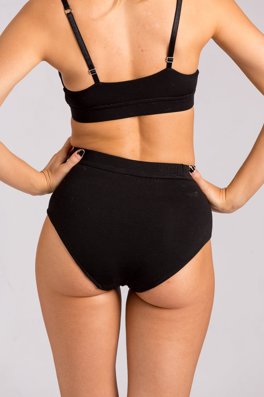 sustainable seaweed underwear. made from seaweed made in london. high waisted black full coverage brief. wrapped waistband makes it super soft on the wearers waist.