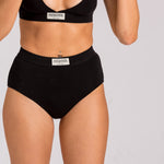 sustainable seaweed underwear. made from seaweed made in london. high waisted black full coverage brief. wrapped waistband makes it super soft on the wearers waist.